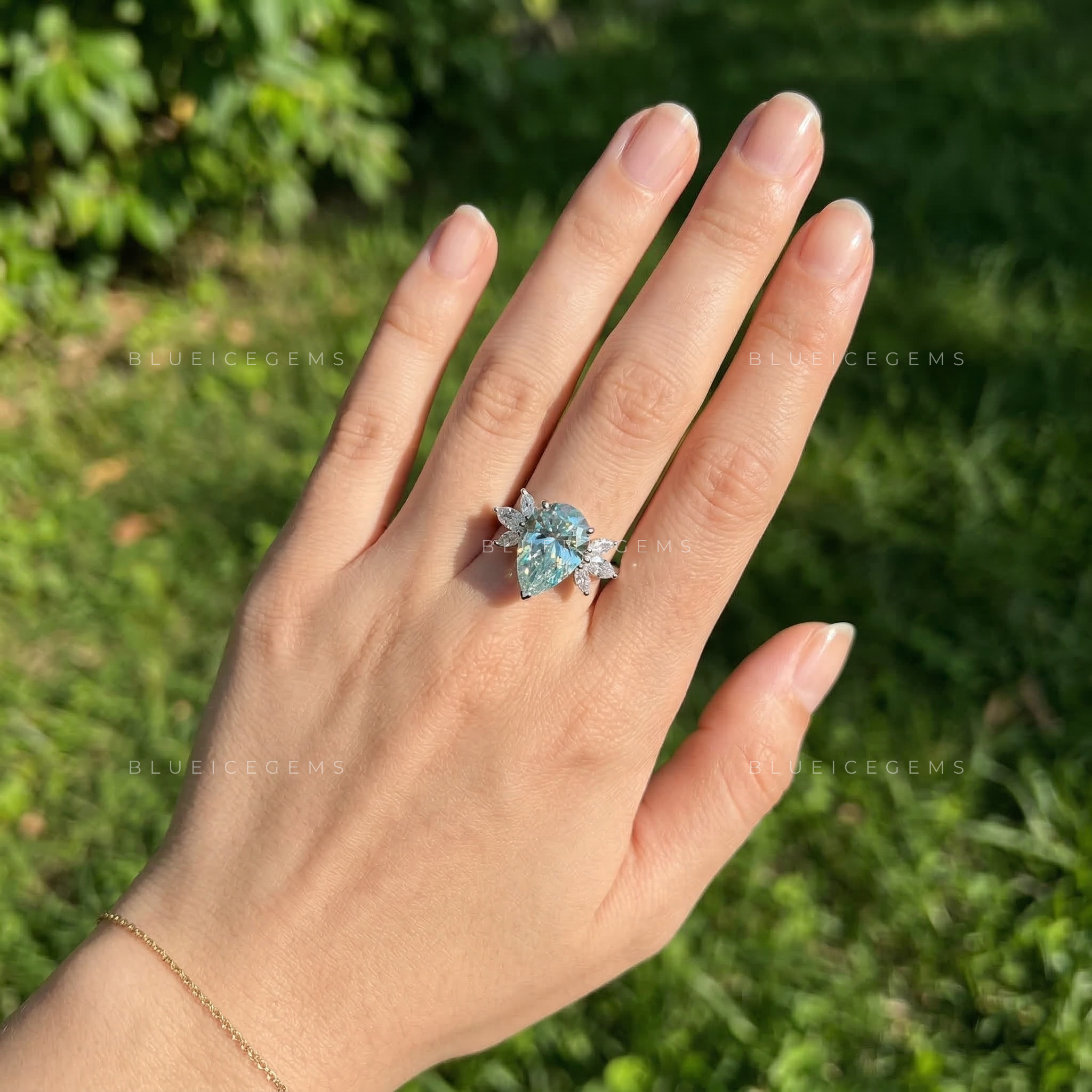 Azure Serenity Pear Cut Marquise Seven Stone Ring