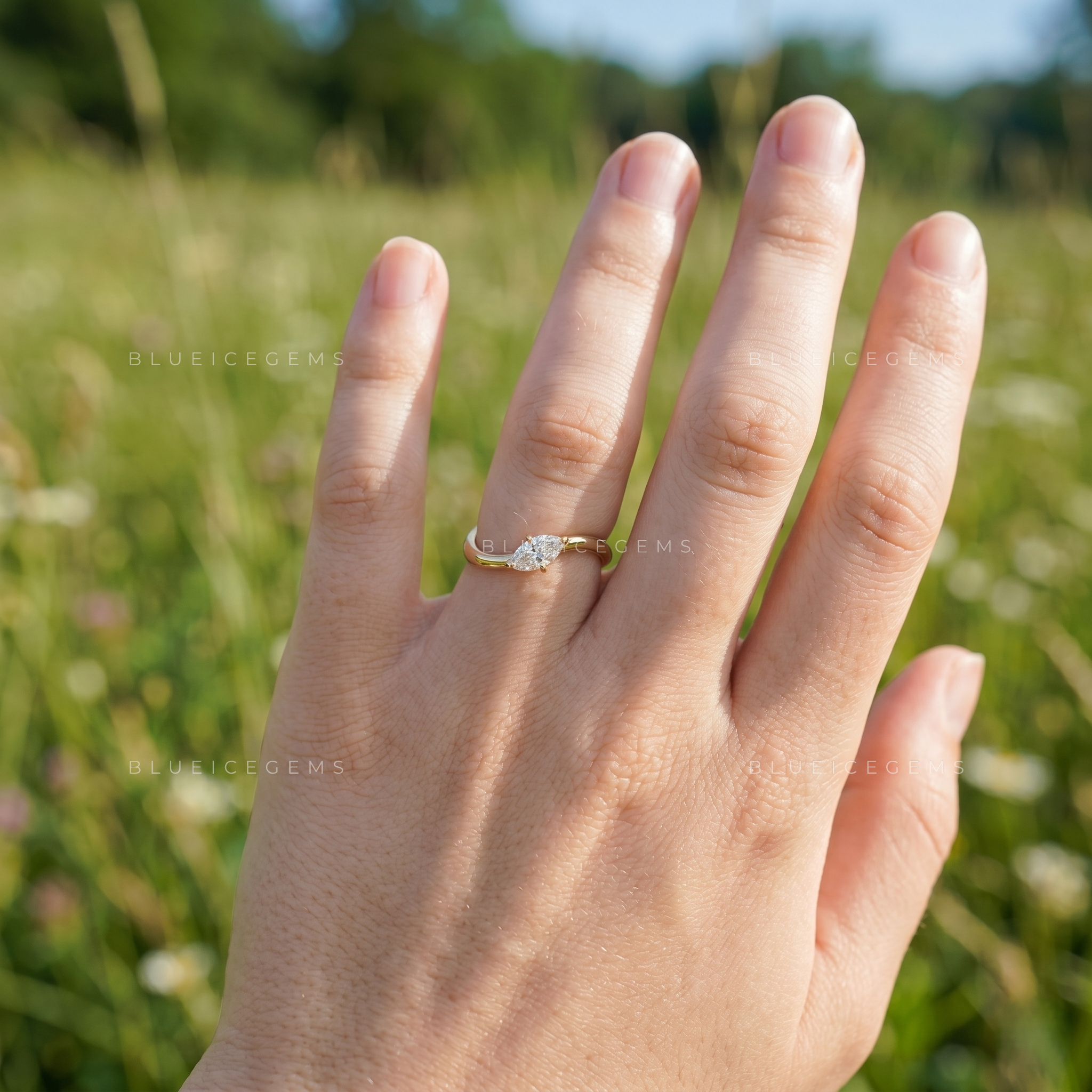Avela Marquise Cut Horizontal East-West Solitaire Ring