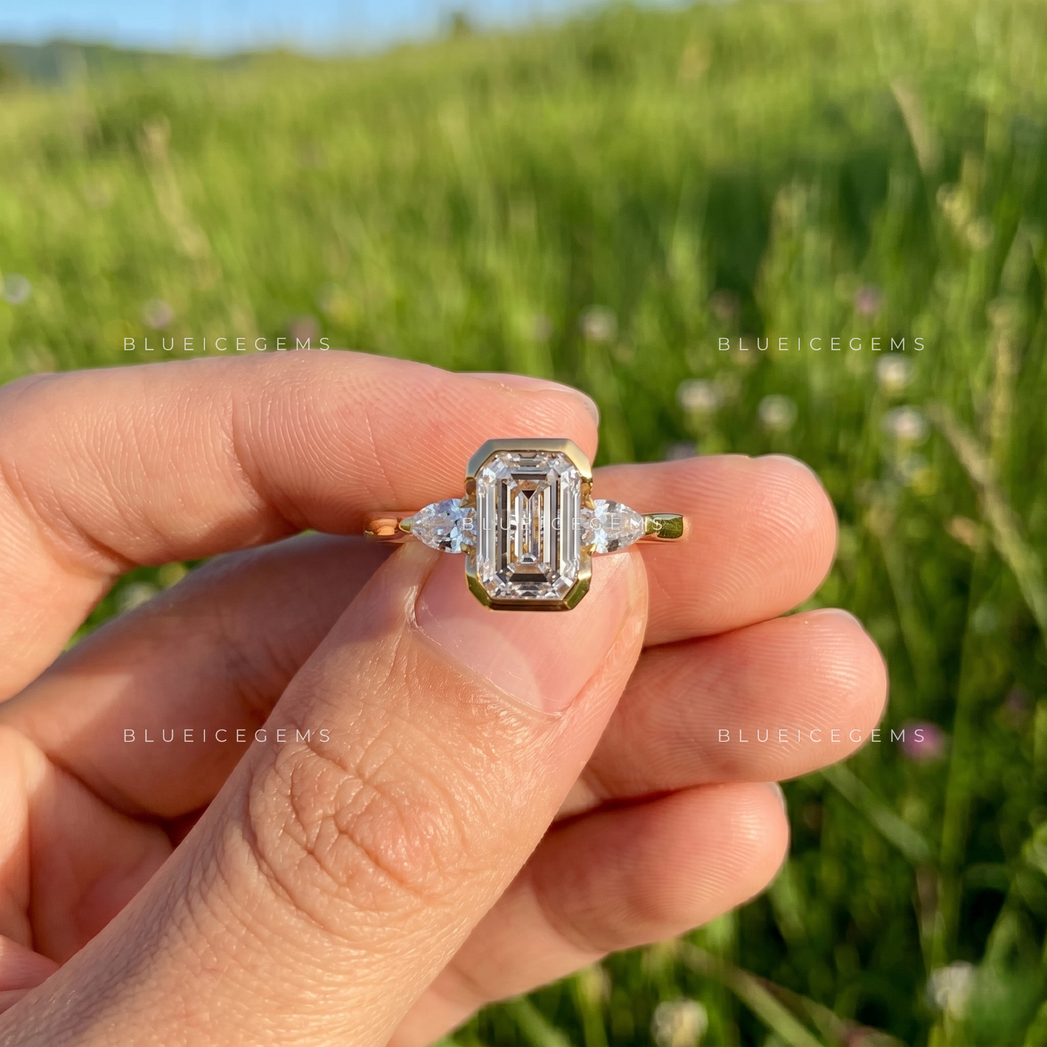Majestic East-West Emerald Cut Pear Three-Stone Engagement Ring