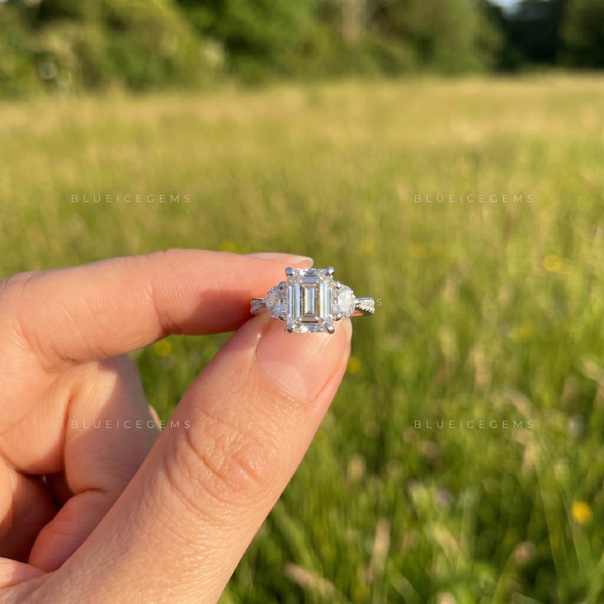 Sophisticated Elegance Elongated Emerald Cut Solitaire with Tapered Accent Band Anniversary Ring