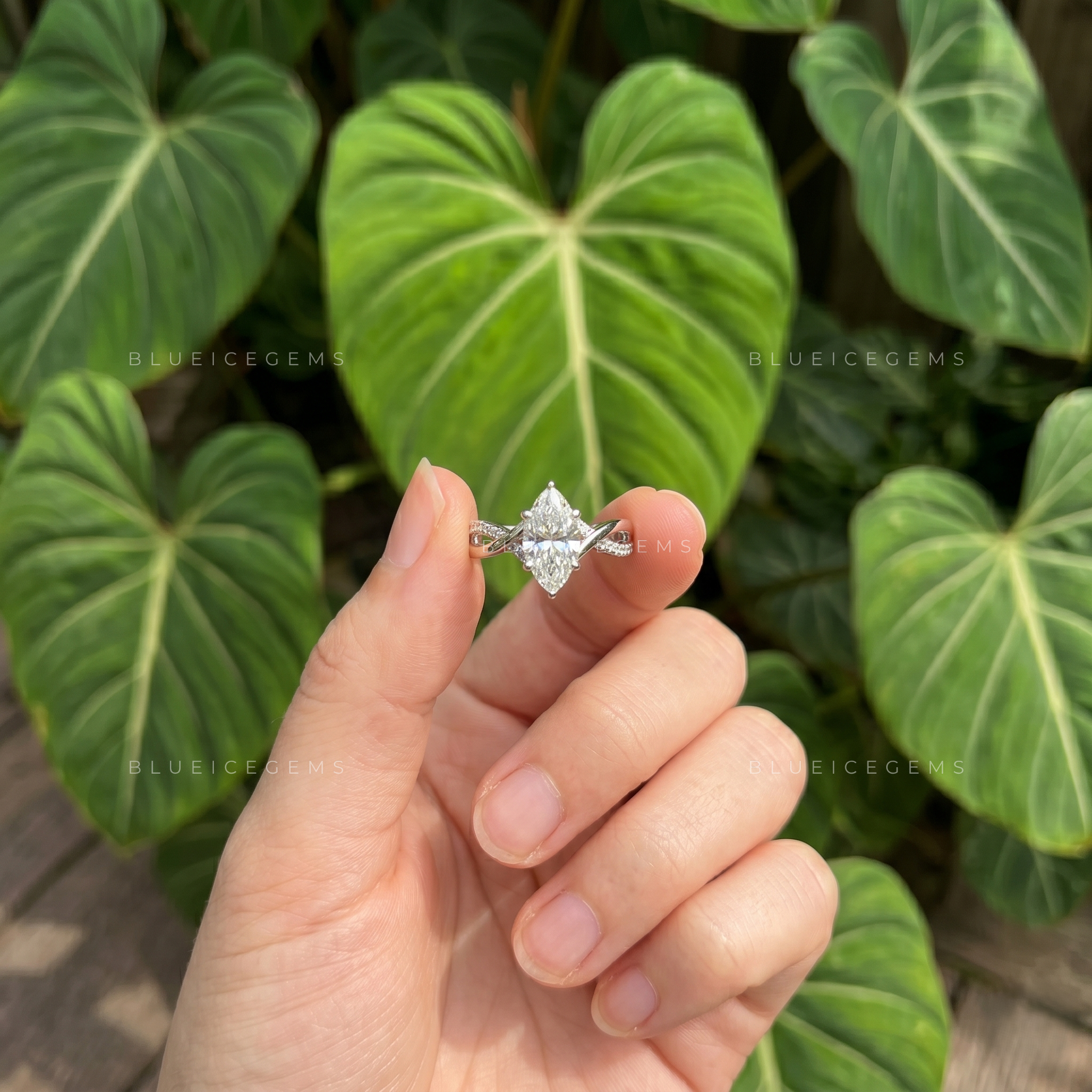 Graceful Twist Marquise Cut Pave Engagement Ring