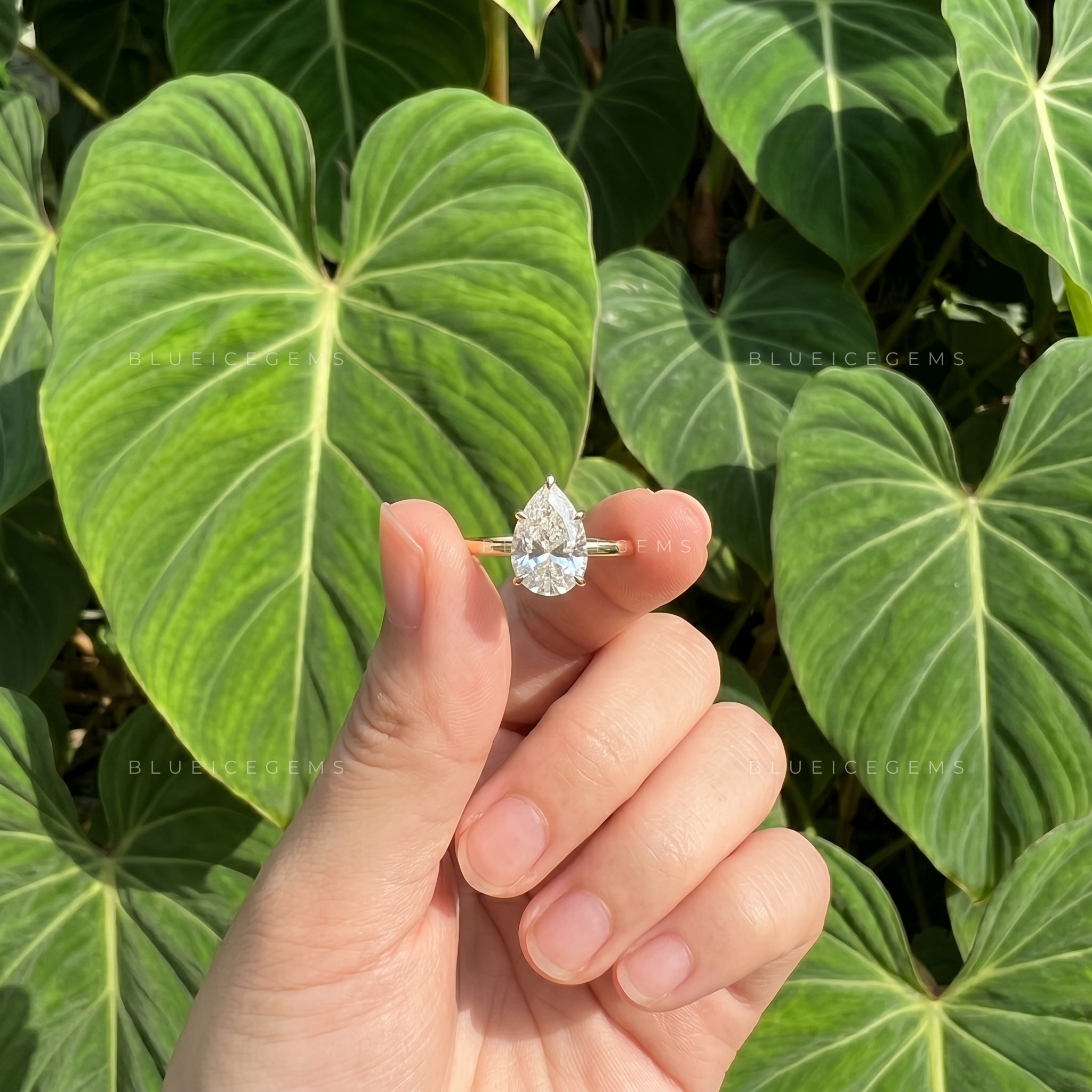 Whispering Grace Dainty Pear Cut Solitaire Engagement Ring
