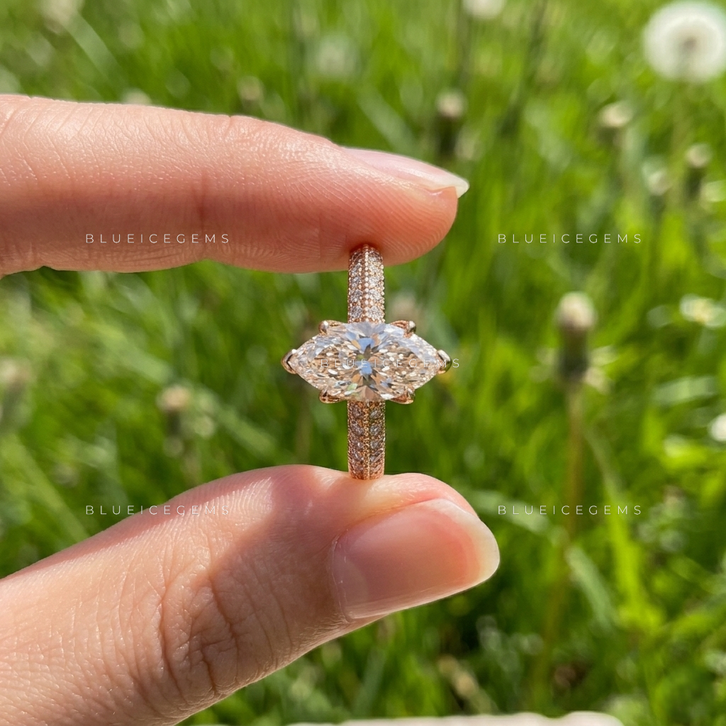 Opulent Crest Marquise Cut Side Stone Engagement Ring