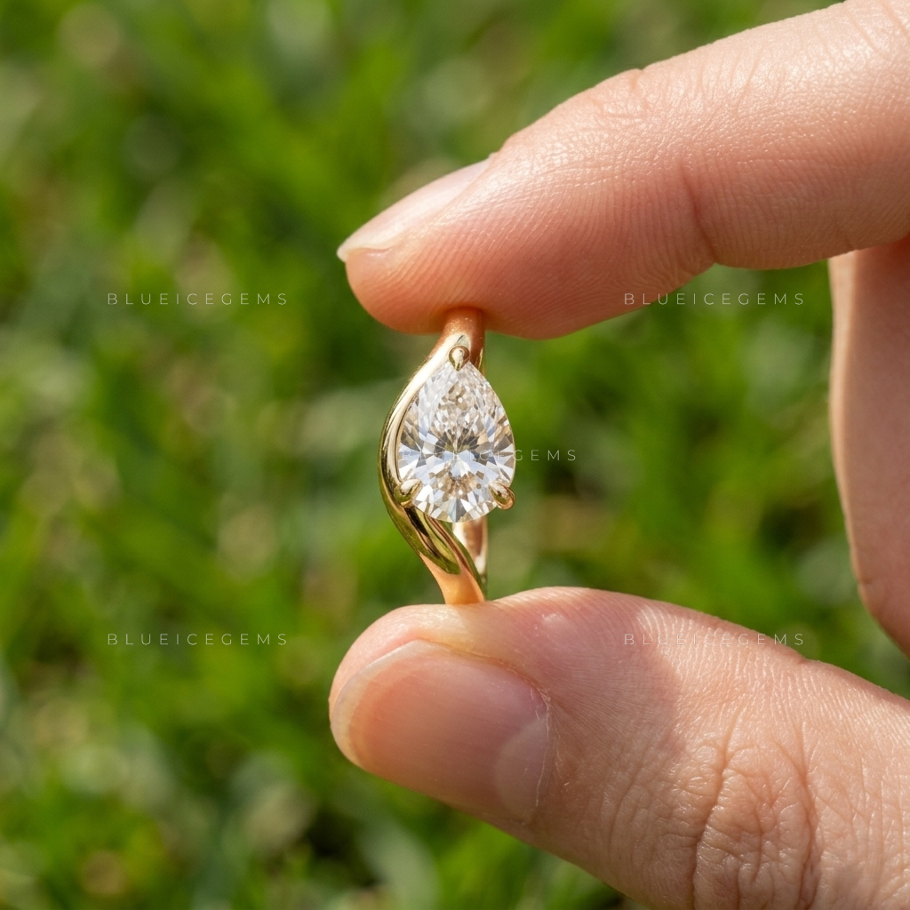 Lunara Tilted Pear Cut East-West Bypass Solitaire Ring