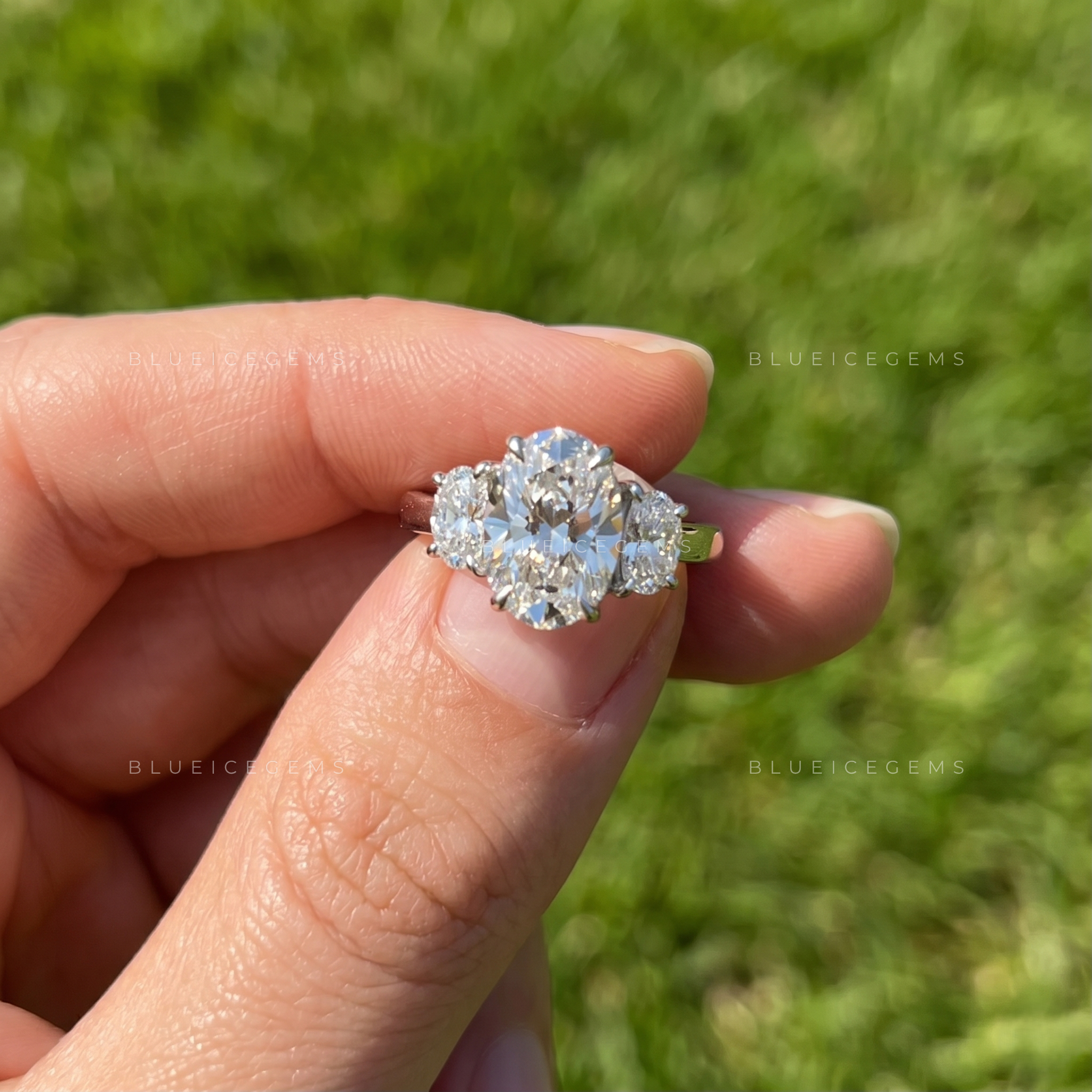 Elegant Symphony Oval Brilliant Cut and Half Moon Three Stone Engagement Ring