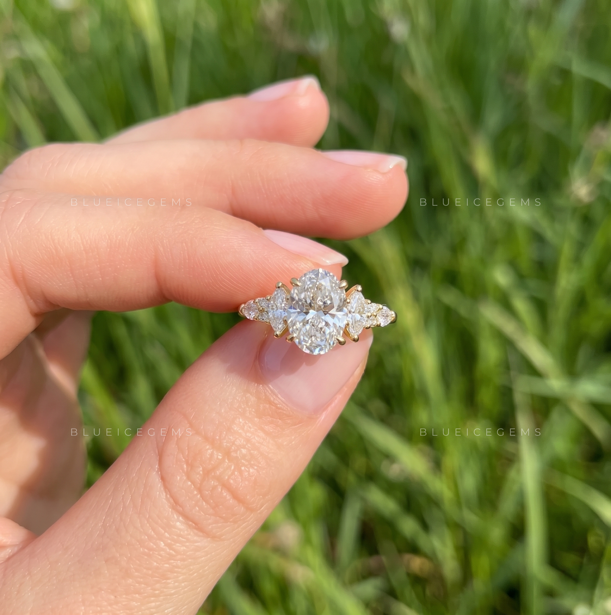 Elara Oval Cut Multi-Shape Cluster Accent Solitaire Engagement Ring
