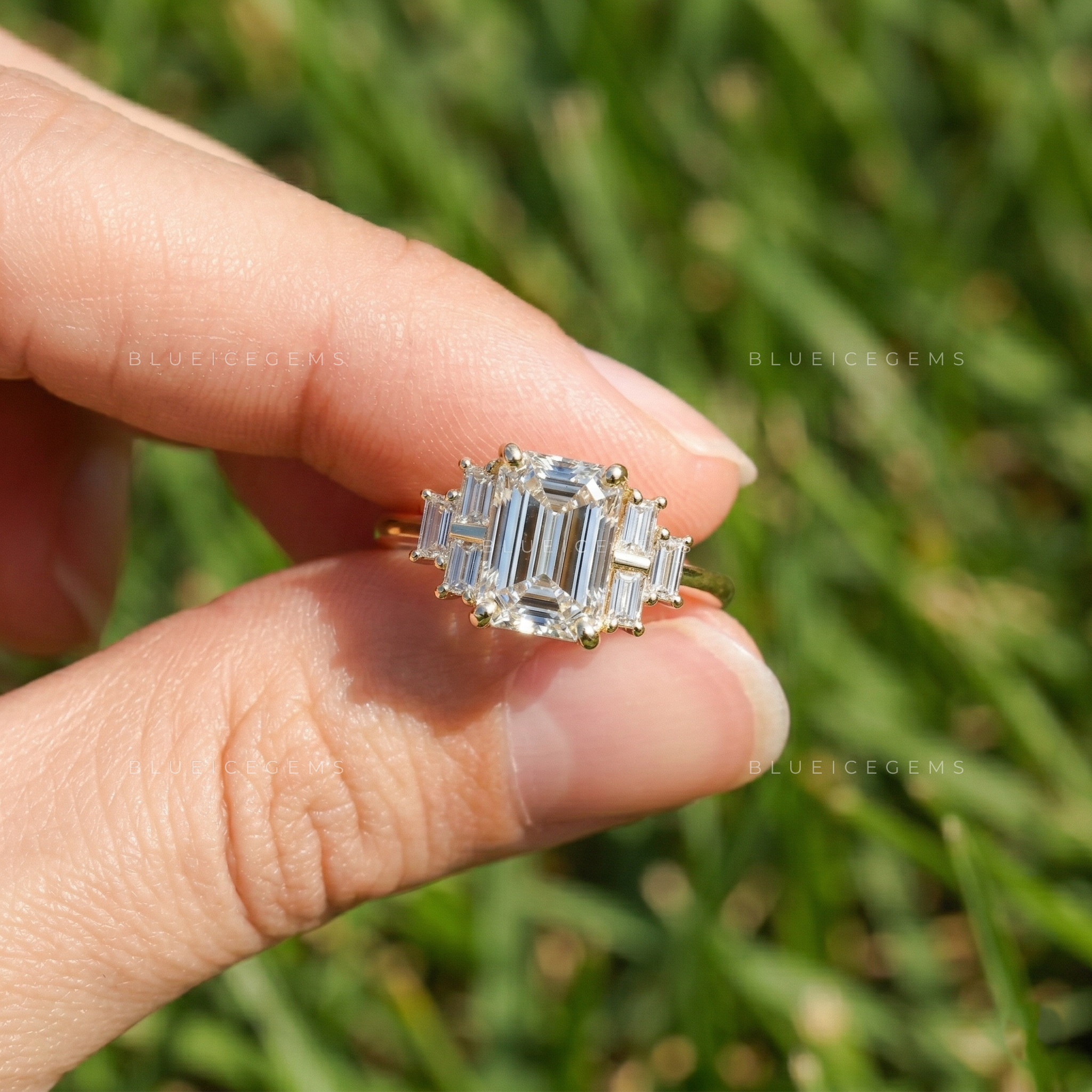 Elegant Emerald Cut Three Stone Side Baguette Engagement Ring