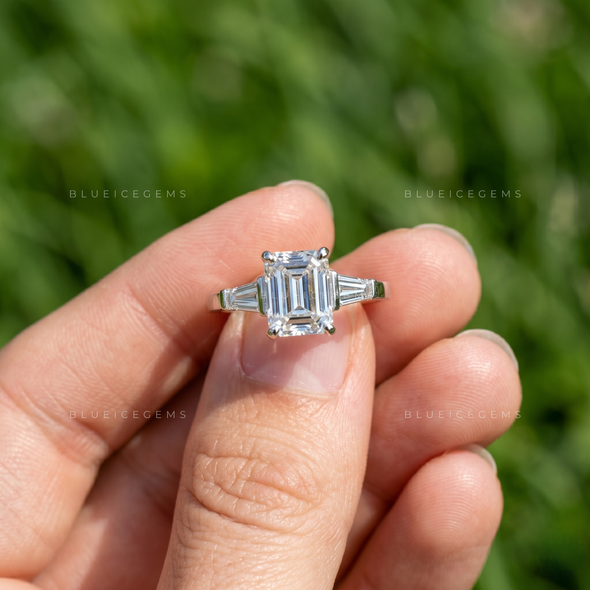 Emerald Cut Trilogy Engagement Ring with Tapered Baguettes
