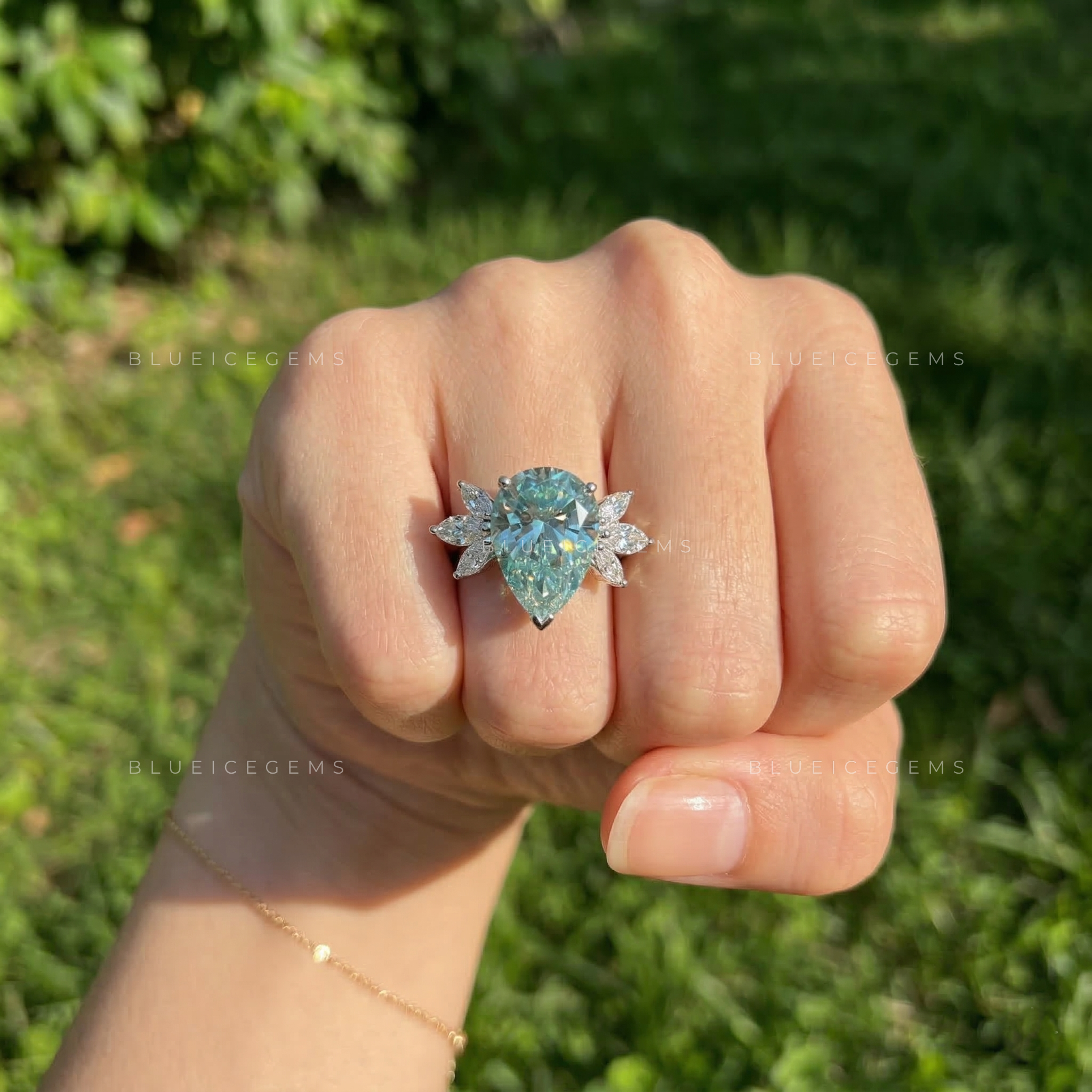 Azure Serenity Pear Cut Marquise Seven Stone Ring