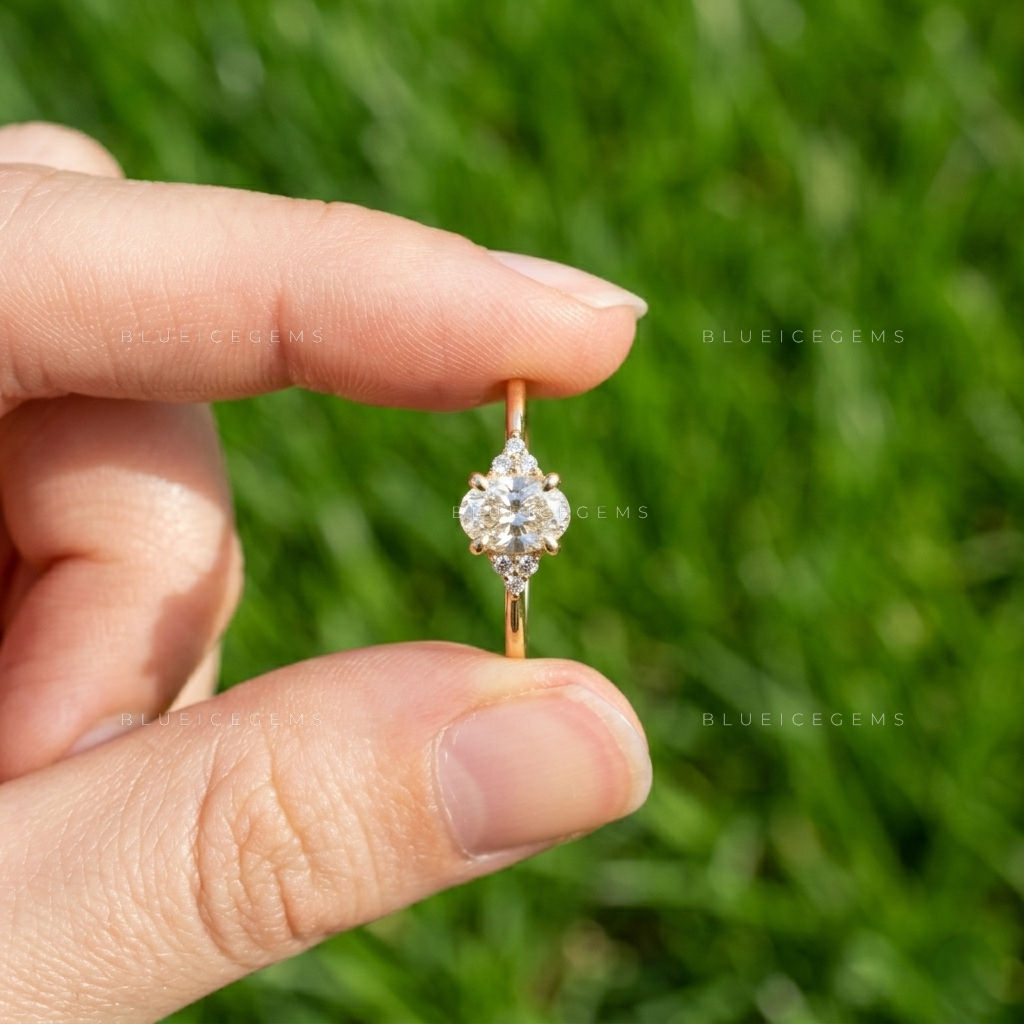 Elara Oval Cut Radiant Cluster Simulated Diamond Engagement Ring