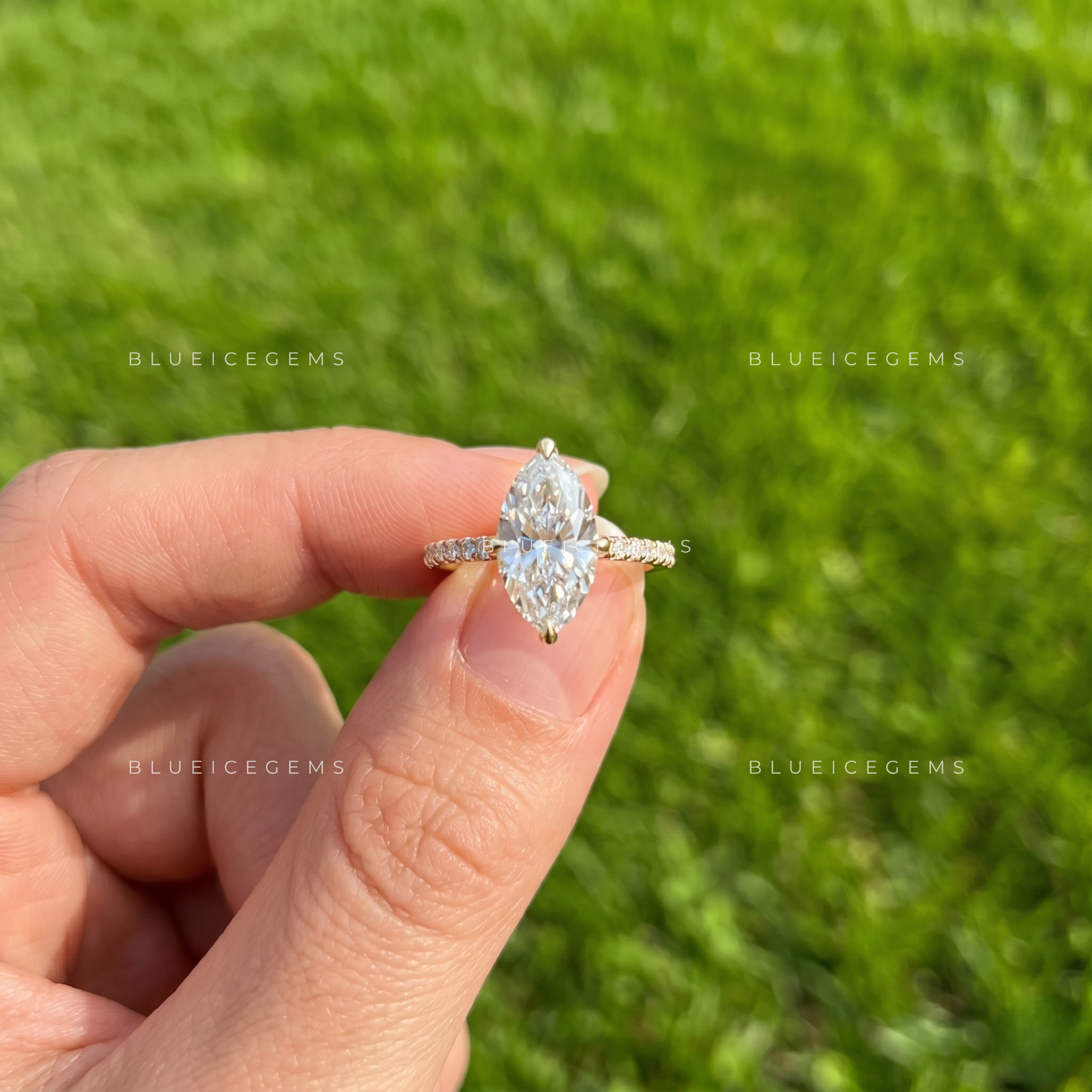 East-West Marquise Cut Cathedral Hidden Halo Engagement Ring