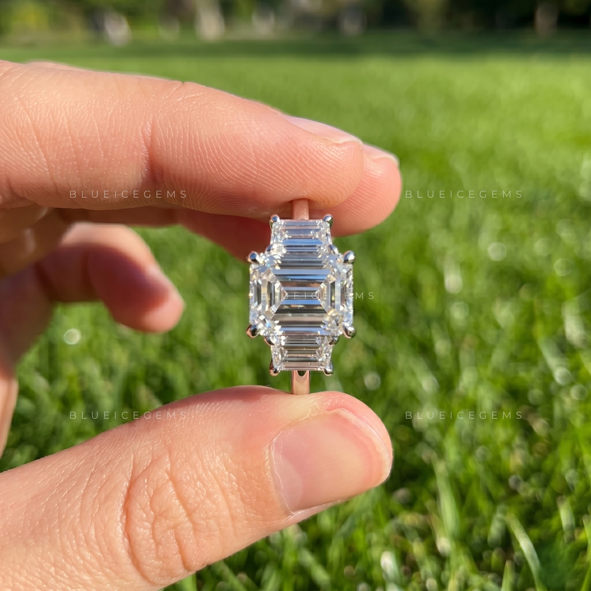Majestic Symmetry Emerald Cut Three-Stone Engagement Ring