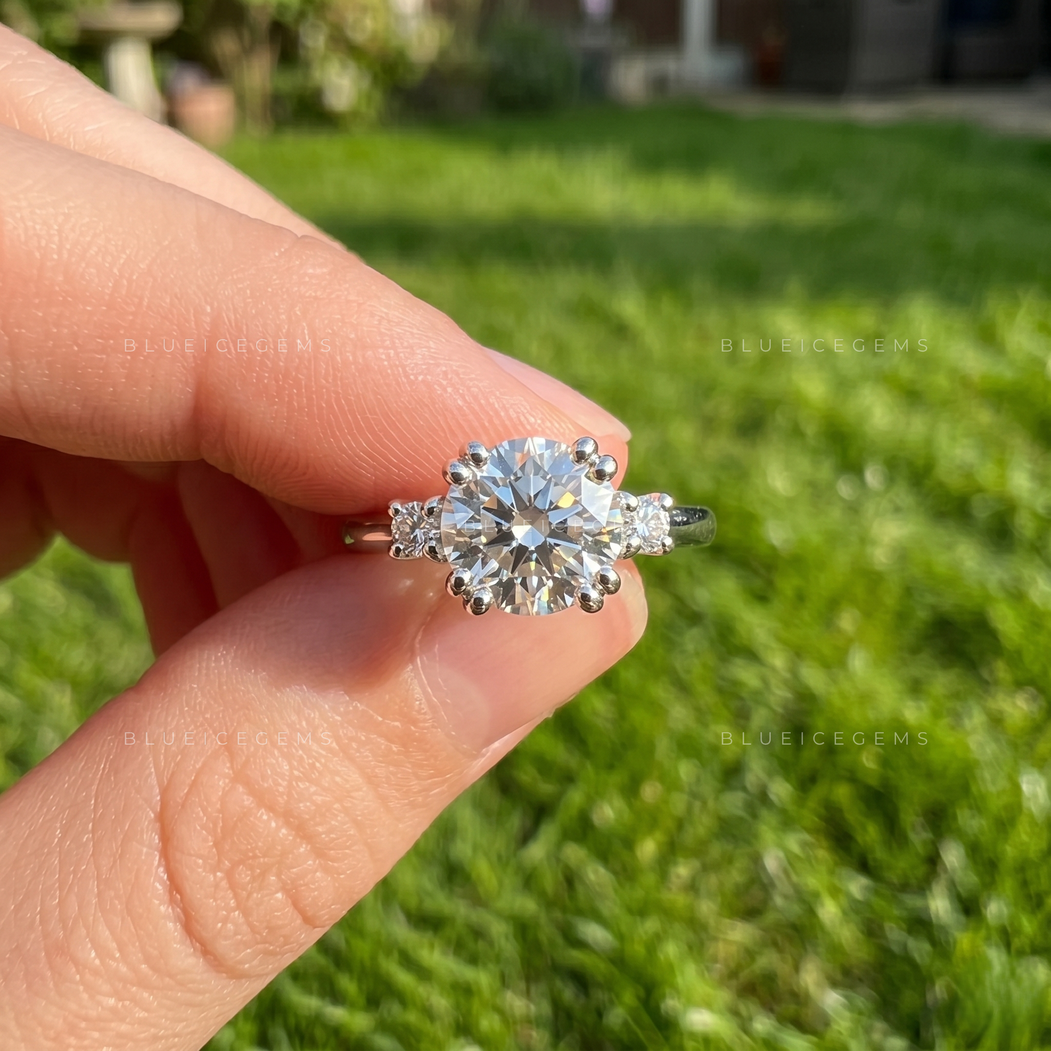 Trinity Radiance Round Cut Double Prong Accent Anniversary Ring