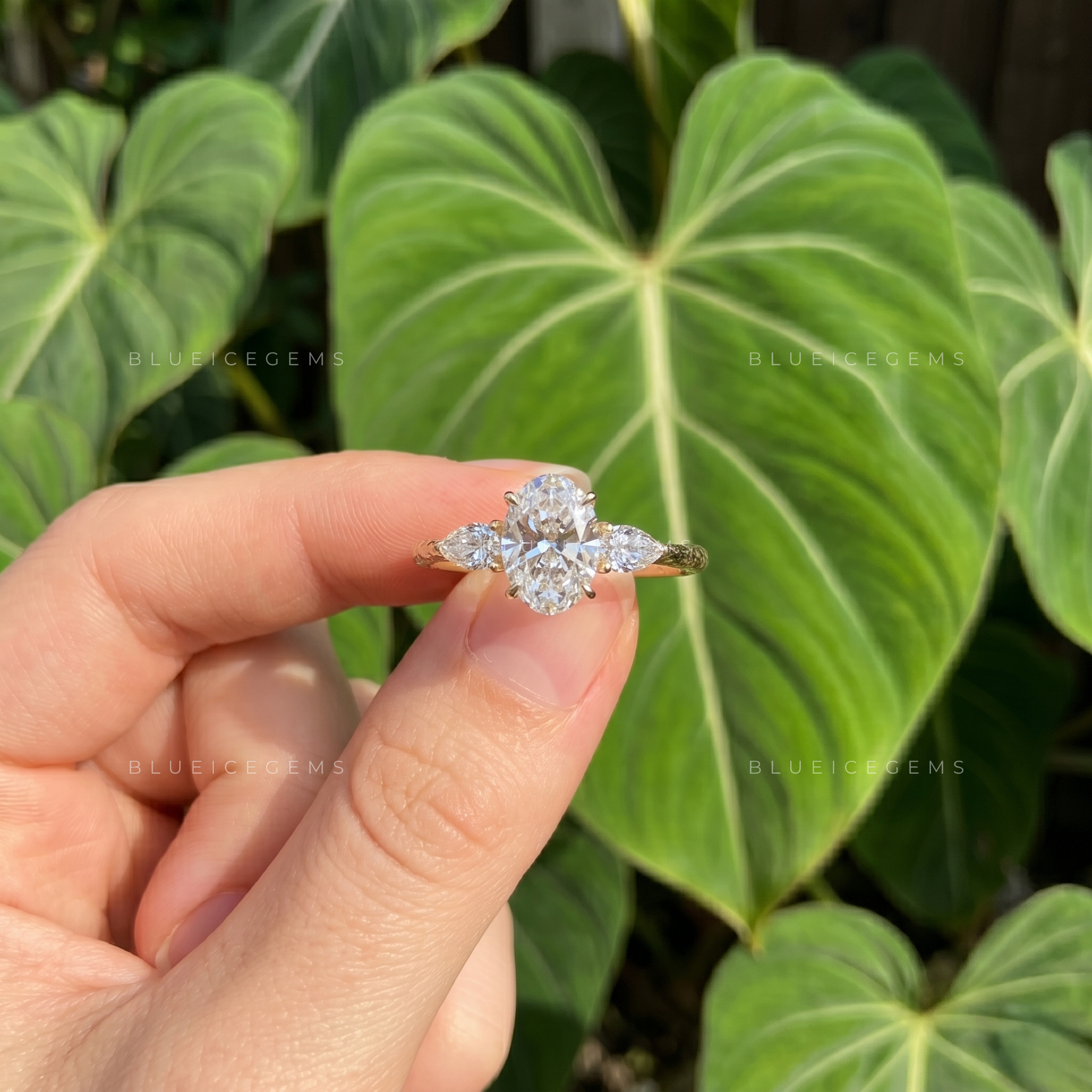 Elegance Unveiled Oval Cut Trilogy Engagement Ring with Pear Accents