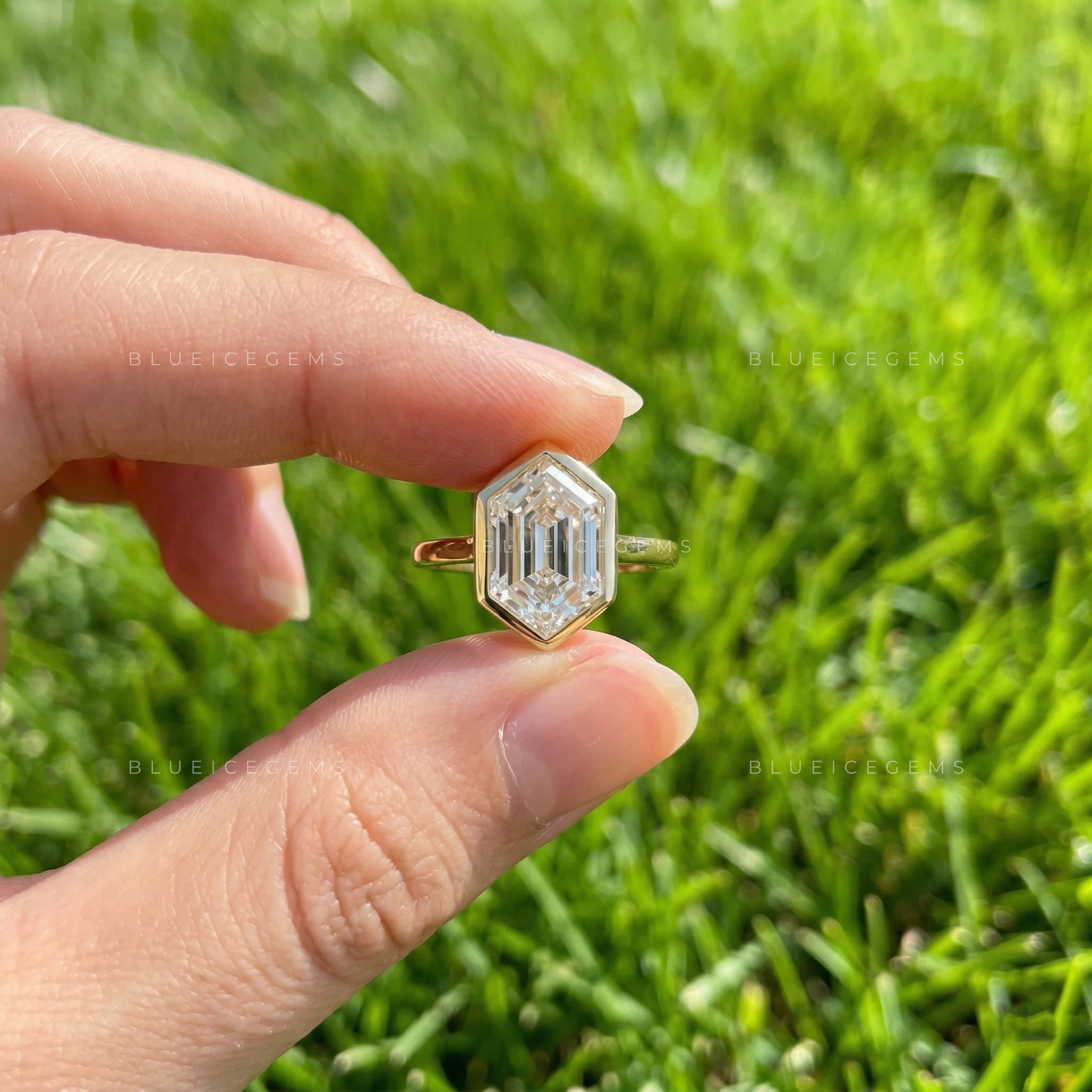Geometric Hexagon Step Cut Bezel Set Cathedral Engagement Ring