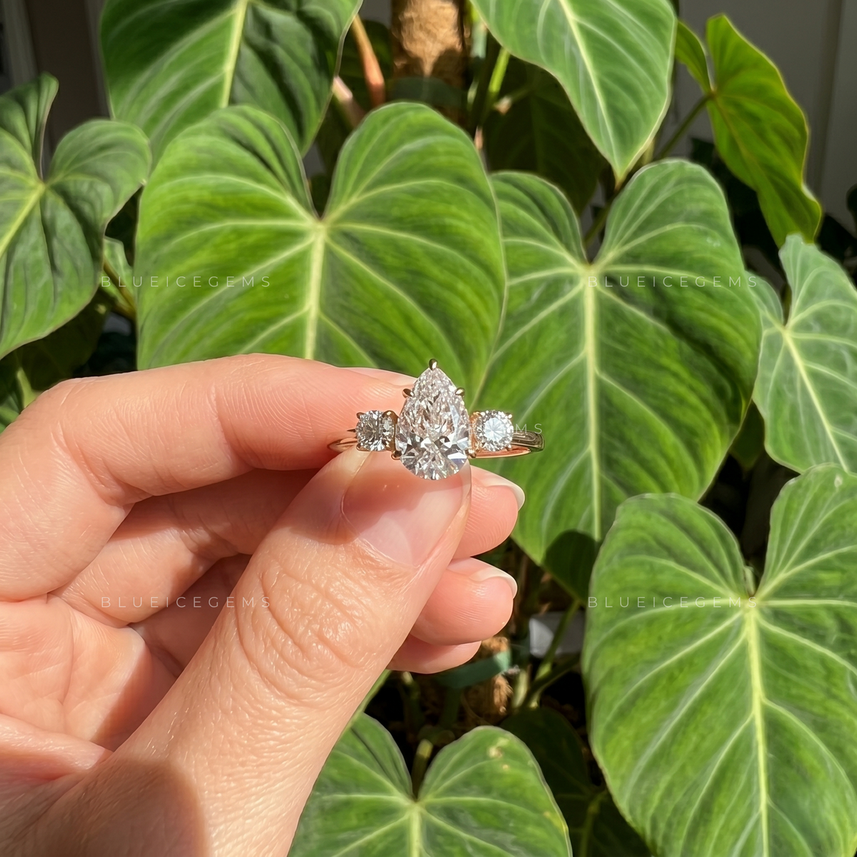 Whispering Romance Pear Cut Three-Stone Engagement Ring