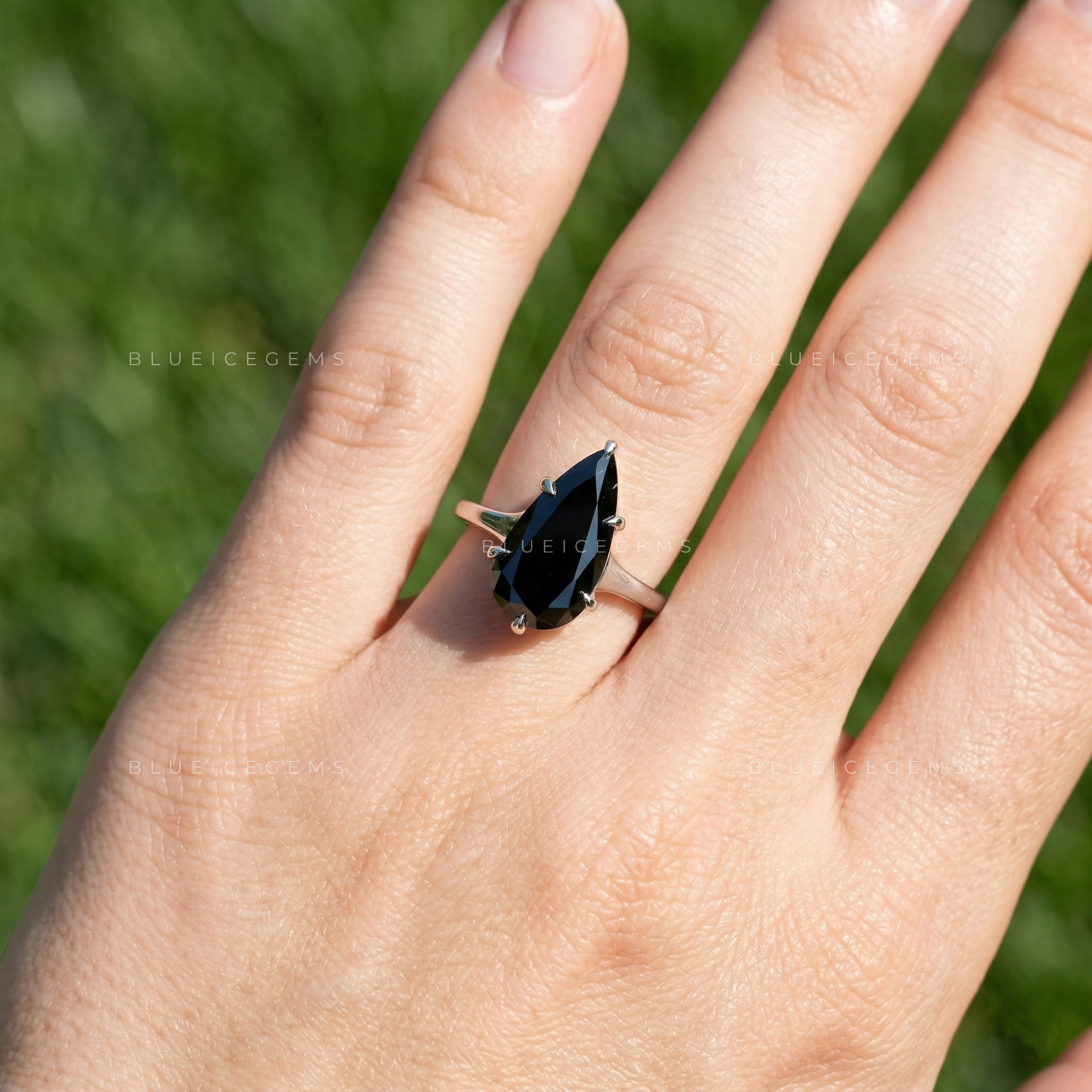 Midnight Noir Pear Cut Moissanite Solitaire Ring