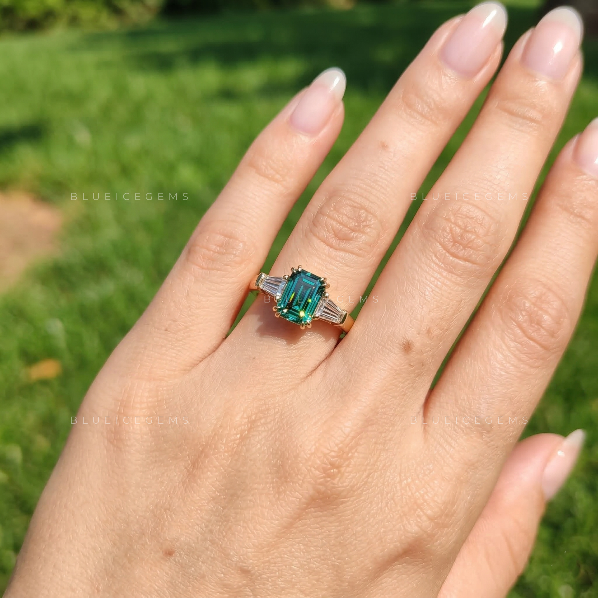 Verdant Elegance Emerald Cut Three-Stone Ring