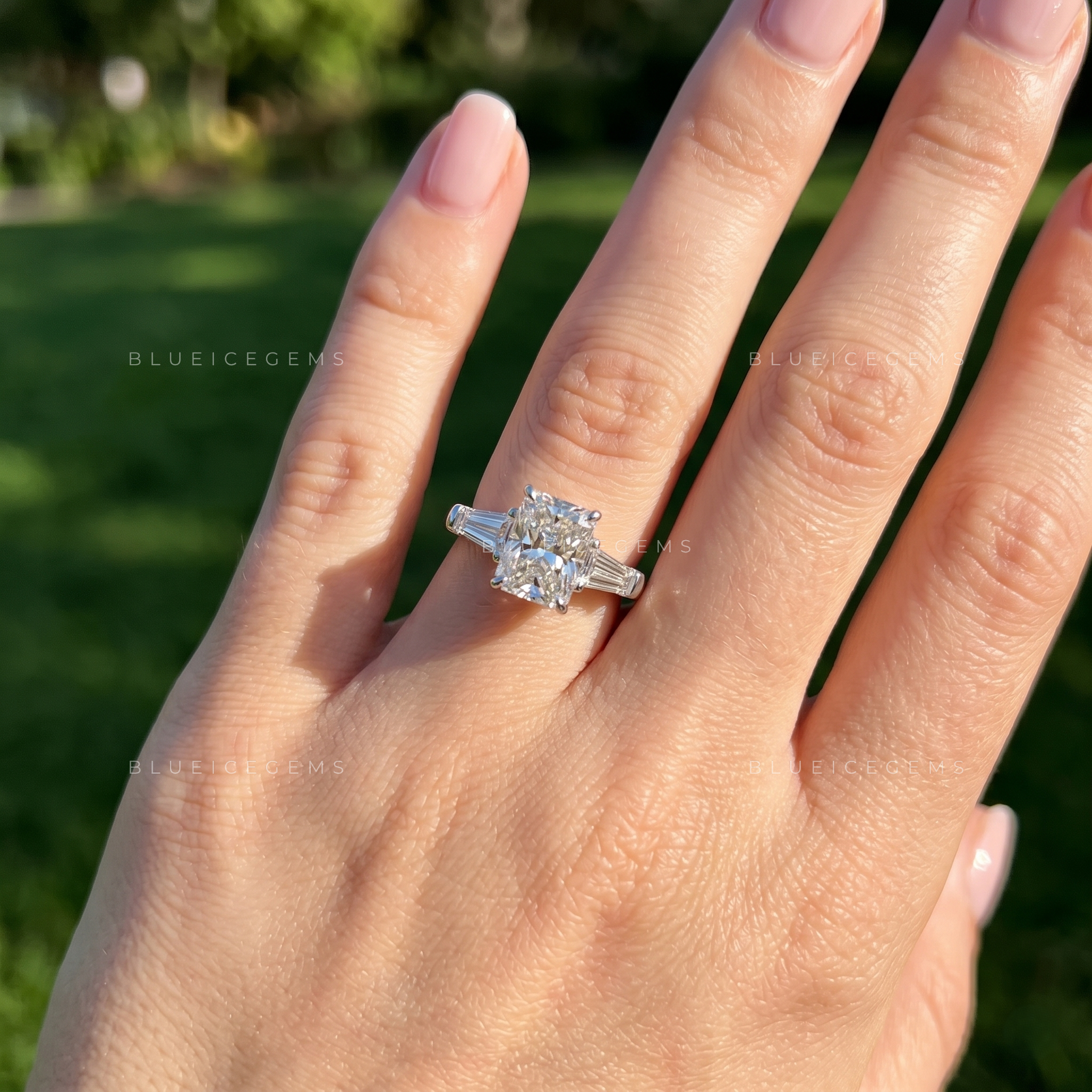 Classic Grace Emerald Cut Three Stone Engagement Ring
