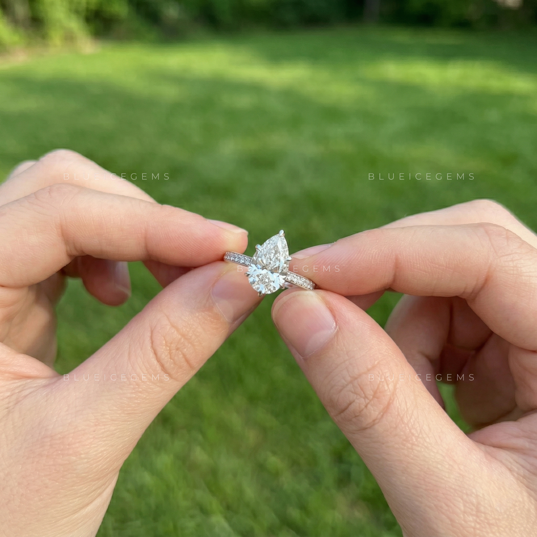 Graceful Radiance Pear Cut Hidden Accent Engagement Ring
