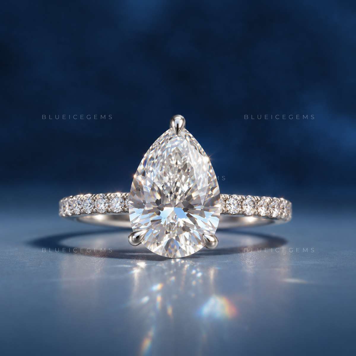 Graceful Pear Cut Hidden Halo Engagement Ring
