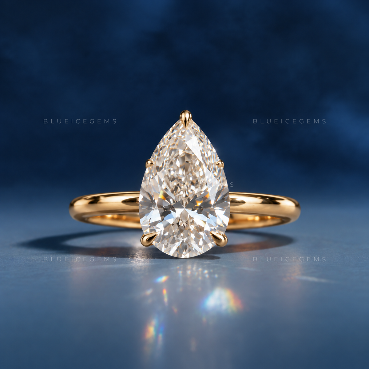 Whispering Grace Dainty Pear Cut Solitaire Engagement Ring